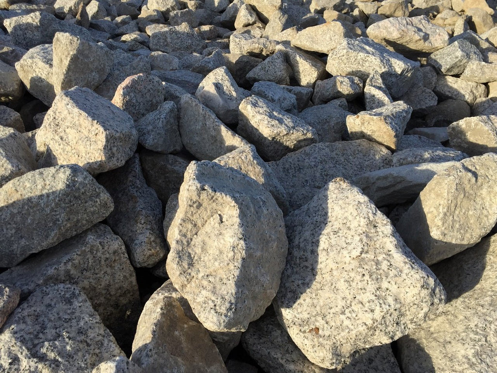 Witte granieten stenen schanskorven
